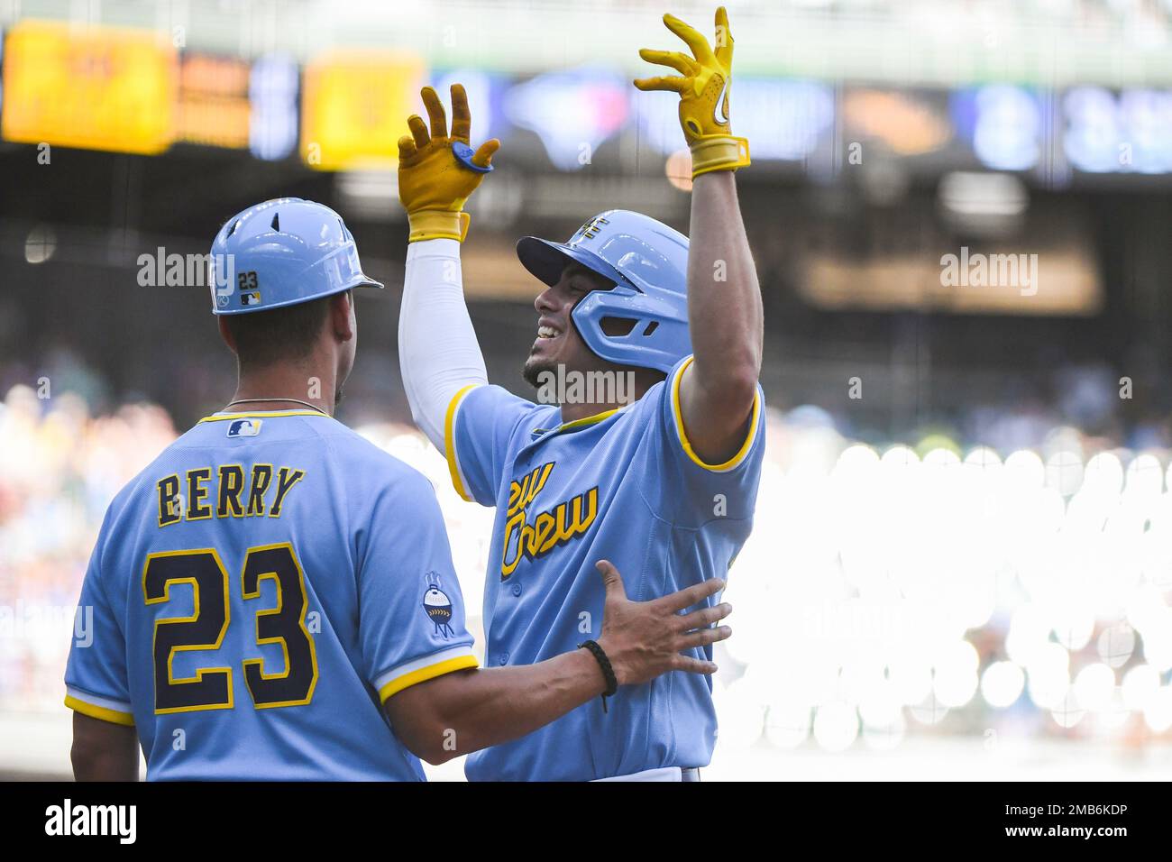 Milwaukee Brewers' Willy Adames, right, celebrates after his base hit  during the eighth inning of a baseball game against the Toronto Blue Jays,  Sunday, June 26, 2022, in Milwaukee. (AP Photo/Kenny Yoo