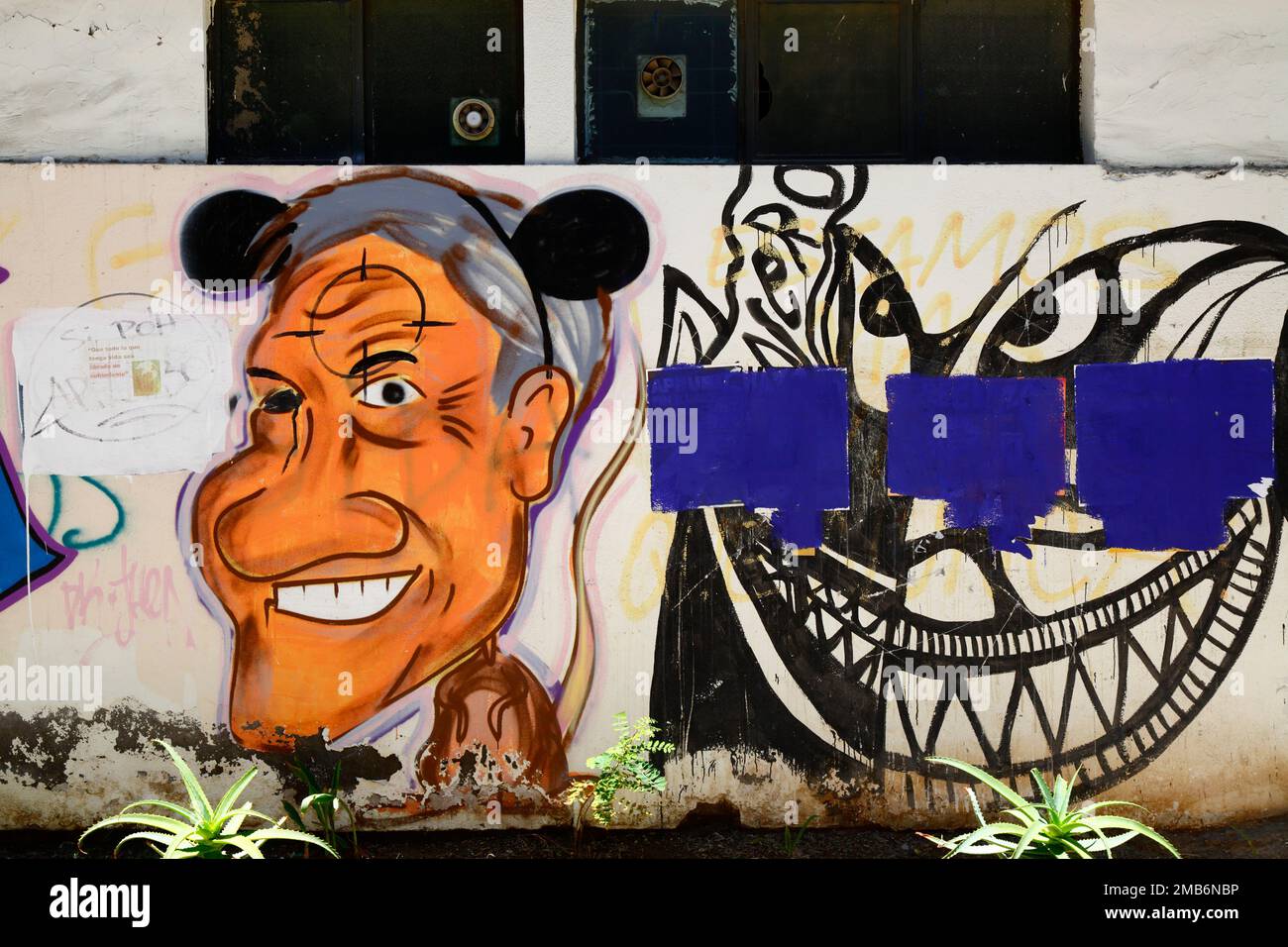 Protest mural showing former Chilean president Sebastián Piñera with Mickey Mouse ears, Copiapo, Chile Stock Photo