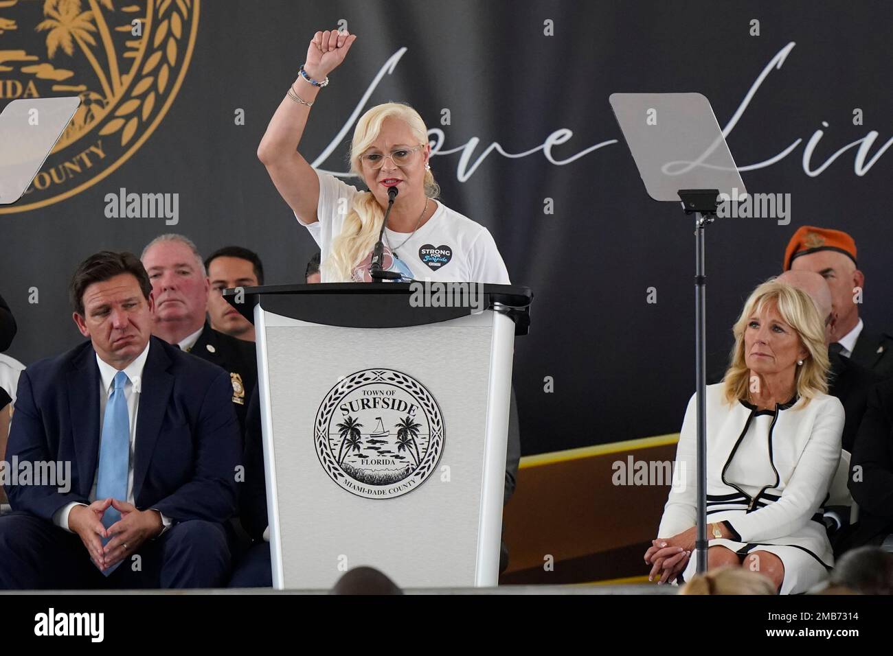 Ashley Dean, who lost her sister Cassie Stratton, speaks during a remembrance event at the site