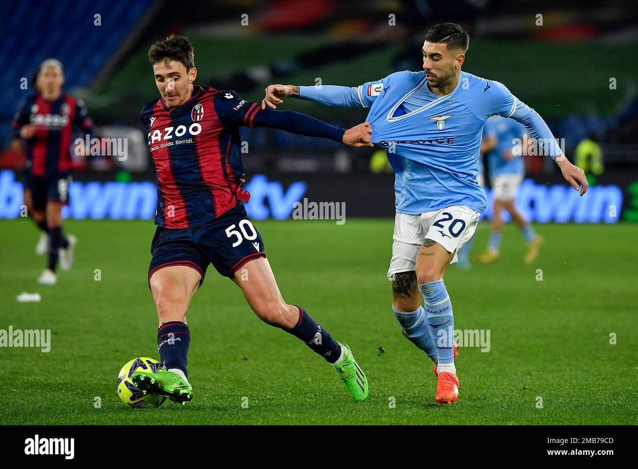 Andrea Cambiaso of Bologna FC and Mattia Zaccagni of SS Lazio compete for the ball during the Italy Cup football match between SS Lazio and Bologna FC Stock Photo
