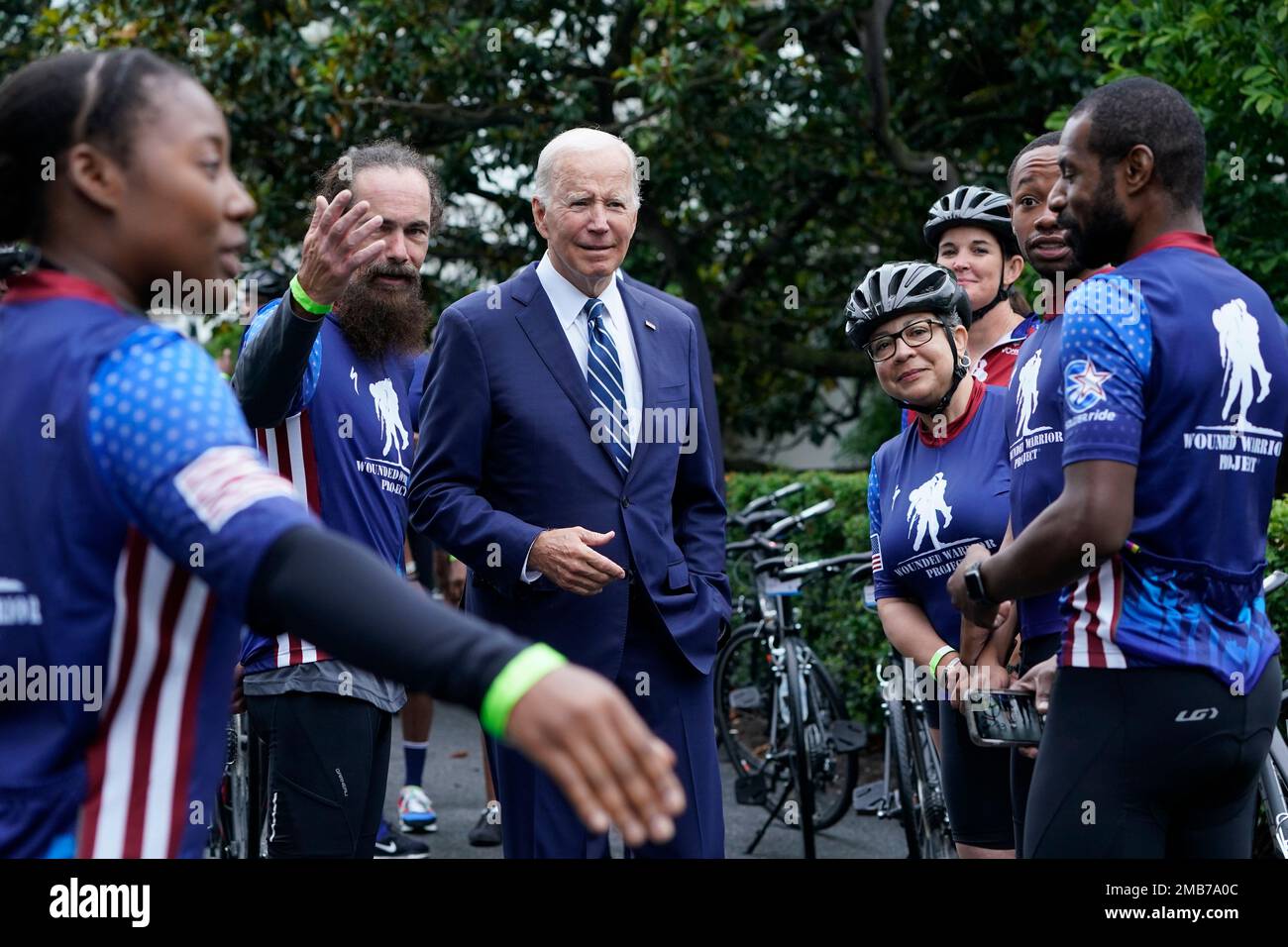 President Joe Biden talks with riders in the Wounded Warrior Project Soldier Ride at the White House in Washington Thursday June 23 2022 following an event to welcome wounded warriors their caregivers