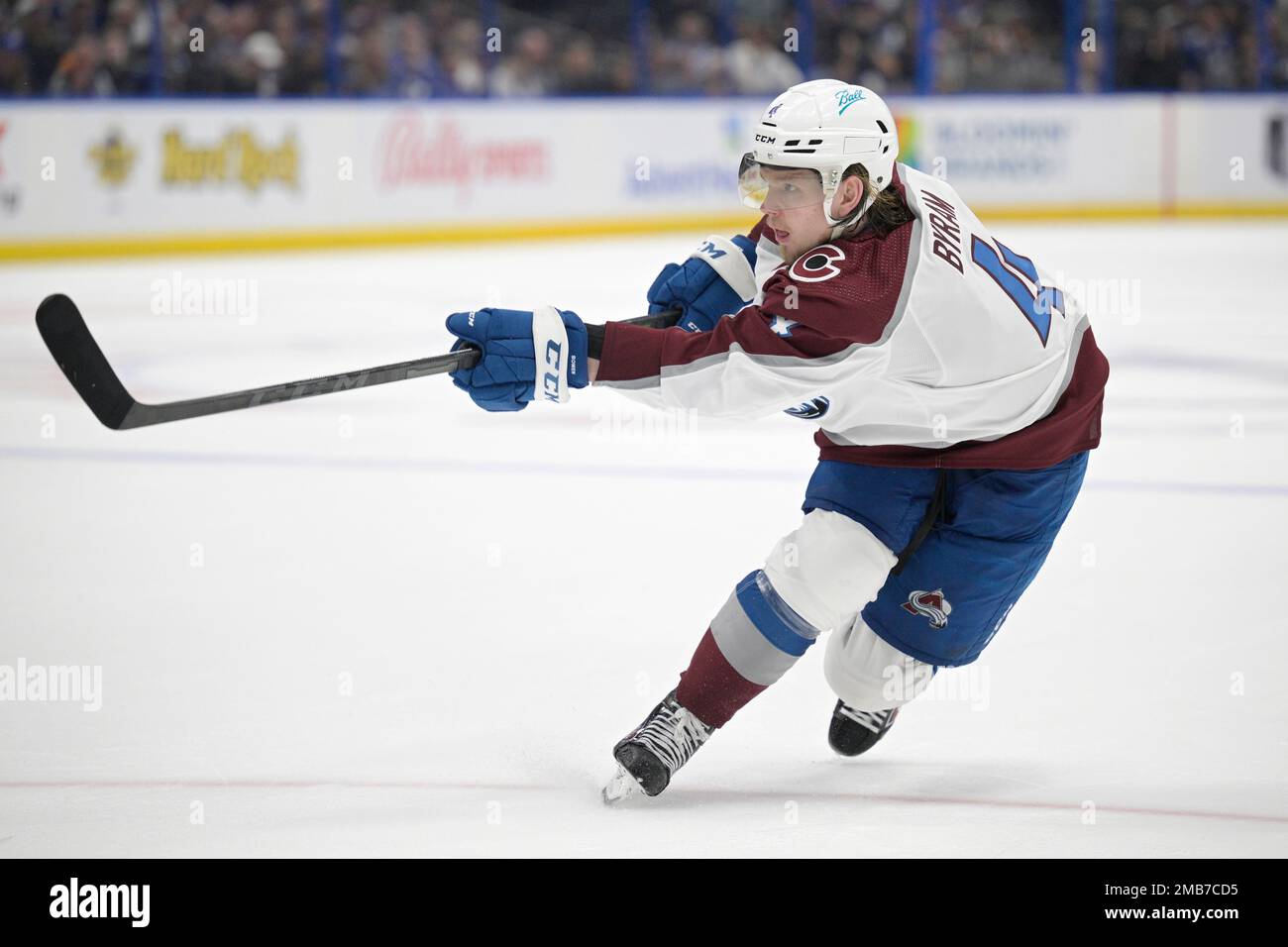 Colorado Avalanche defenseman Bowen Byram (4) attempts a shot during the  second period of Game 4 of the NHL hockey Stanley Cup Finals against the  Tampa Bay Lightning on Wednesday, June 22