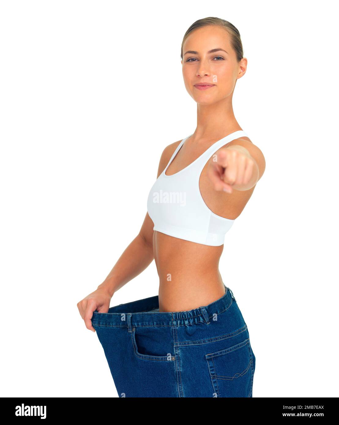Health, weight loss and woman pointing hand with jeans and tummy tuck