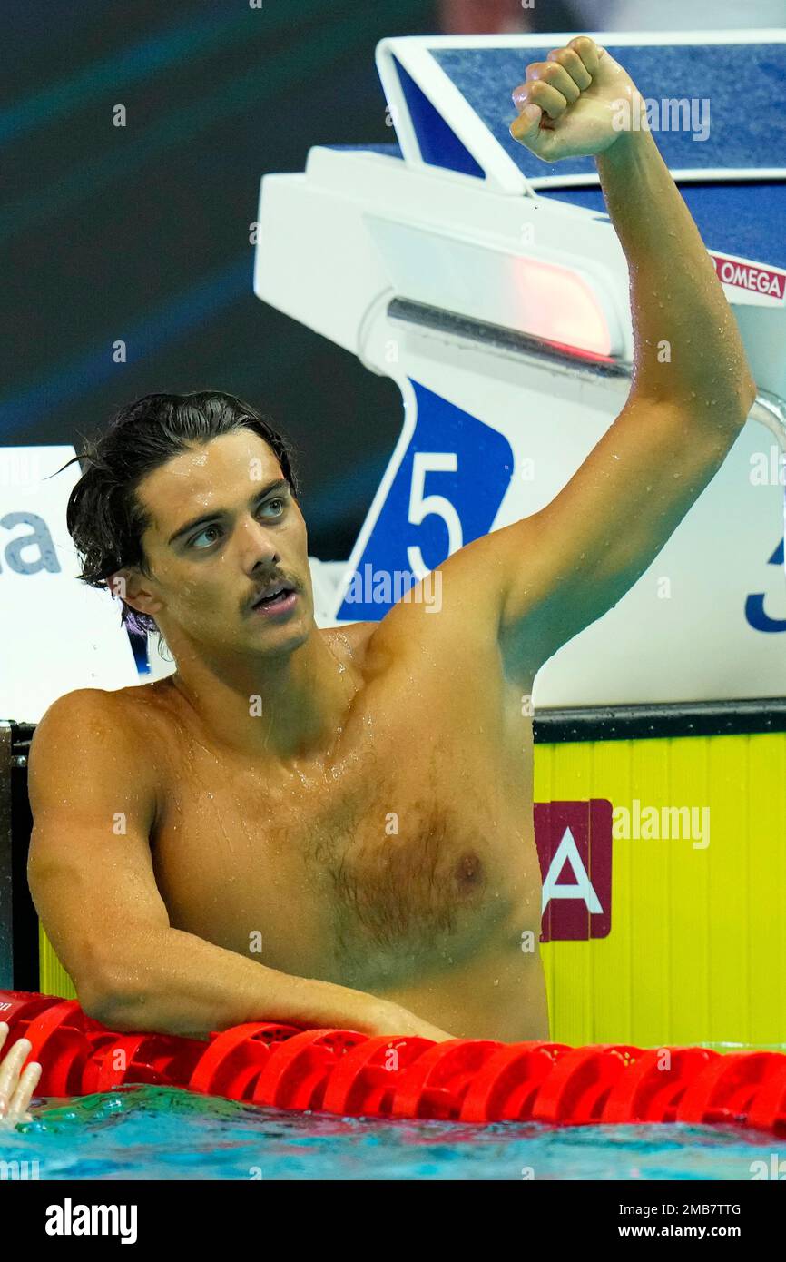 Thomas Ceccon of Italy celebrates after winning the Men 100m Backstroke