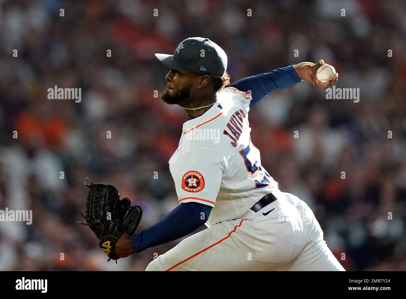 Houston Astros starting pitcher Cristian Javier throws against the