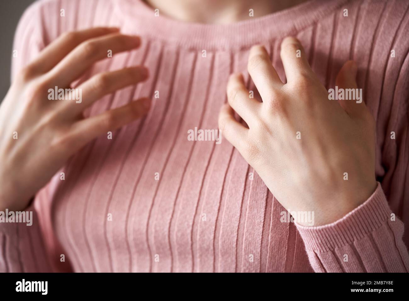 Hands of a young woman practicing EFT or emotional freedom technique