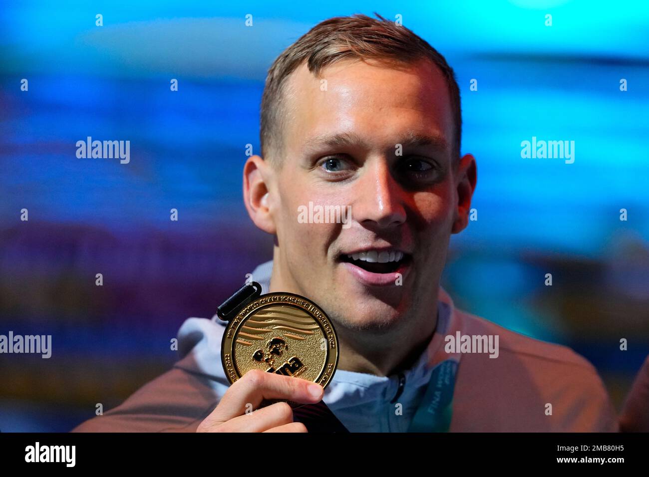Caeleb Dressel of the United States poses with his medal after winning ...