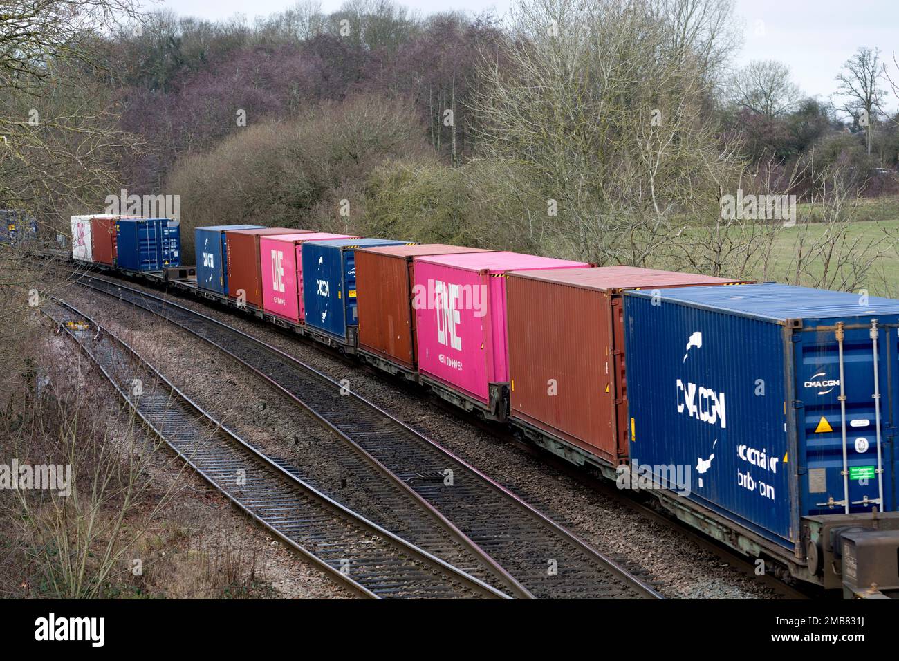 Shipping containers on an intermodal train, Warwickshire, UK Stock