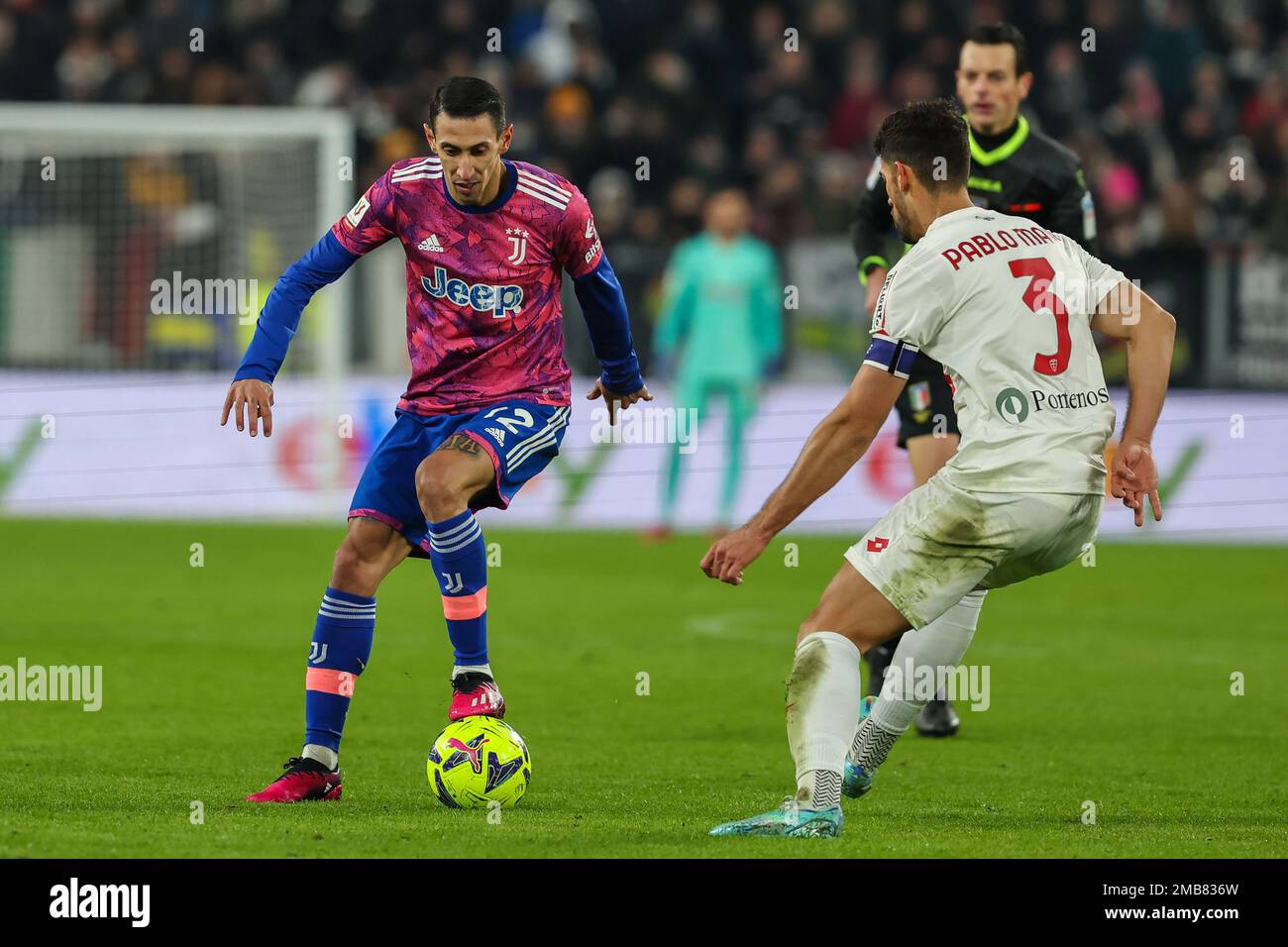 Turin, Italy. 19th Jan, 2023. Angel Di Maria of Juventus FC (L) and Pablo Mari of AC Monza (R) in action during Coppa Italia 2022/23 football match between Juventus FC and AC Monza at Allianz Stadium. Final score; Juventus 2:1 Monza. Credit: SOPA Images Limited/Alamy Live News Stock Photo