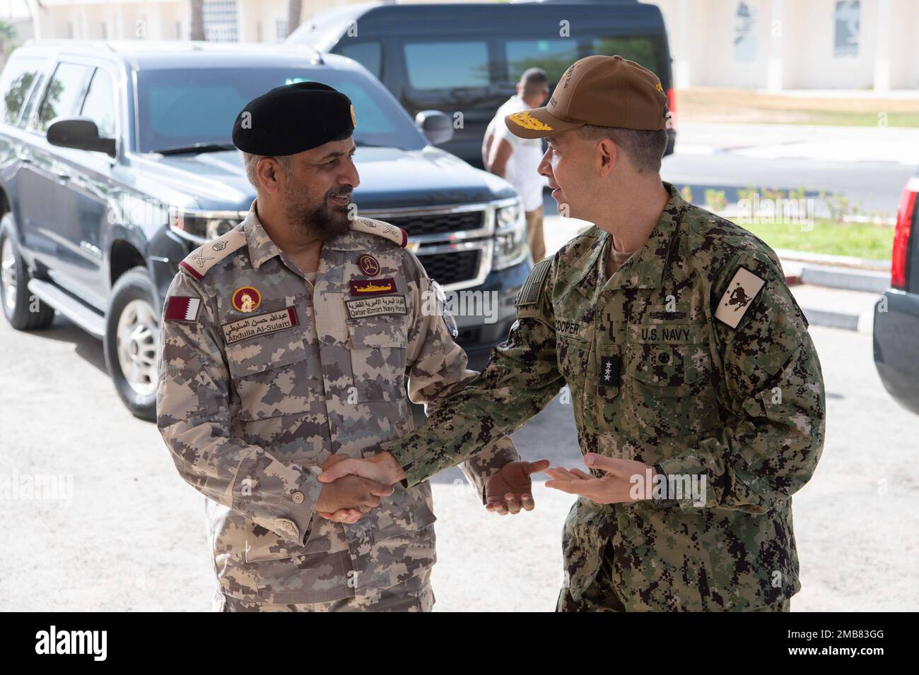 220613-N-ZA692-1012 DOHA, Qatar (June 13, 2022) Vice Adm. Brad Cooper, commander of U.S. Naval Forces Central Command, U.S. 5th Fleet and Combined Maritime Forces, is greeted by Staff Maj. Gen. (Navy) Abdulla Hassan Al-Sulaiti, commander of Qatar Emiri Naval Forces, during a visit to Qatar’s naval headquarters in Doha, Qatar, June 13. Stock Photo