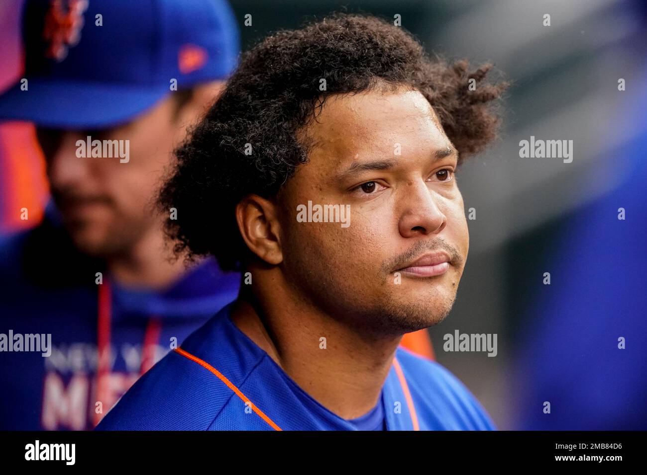 New York Mets starting pitcher Taijuan Walker (99) stands in the dugout