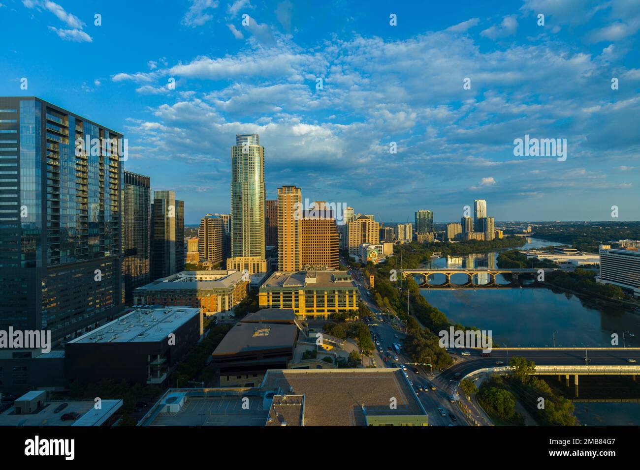 Elevated view Austin Texas city skyline in evening with Ladybird Lake