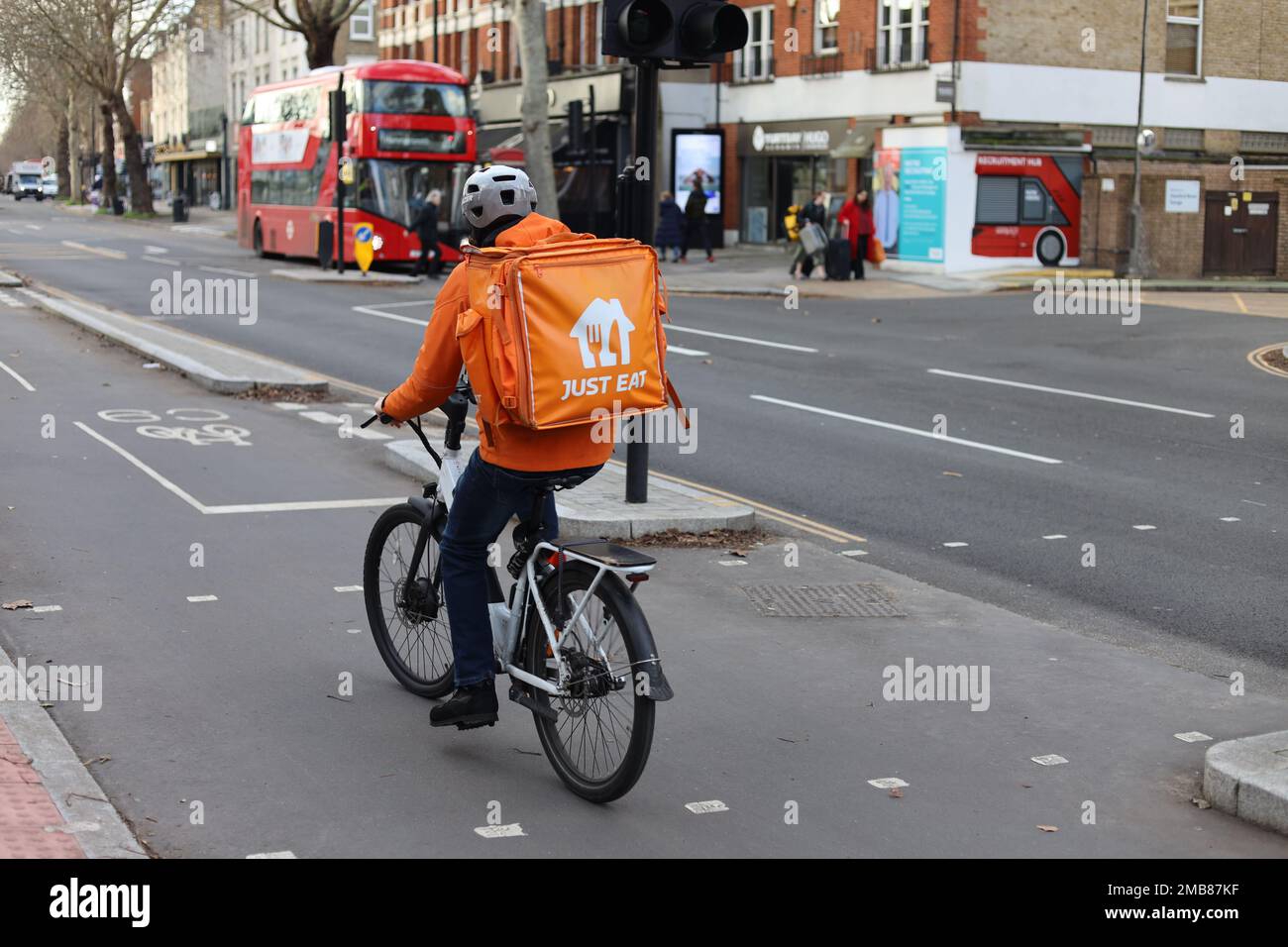 London - Just Eat delivery cyclist riding in cycle lane. Credit: Sinai Noor/Alamy Stock Photo