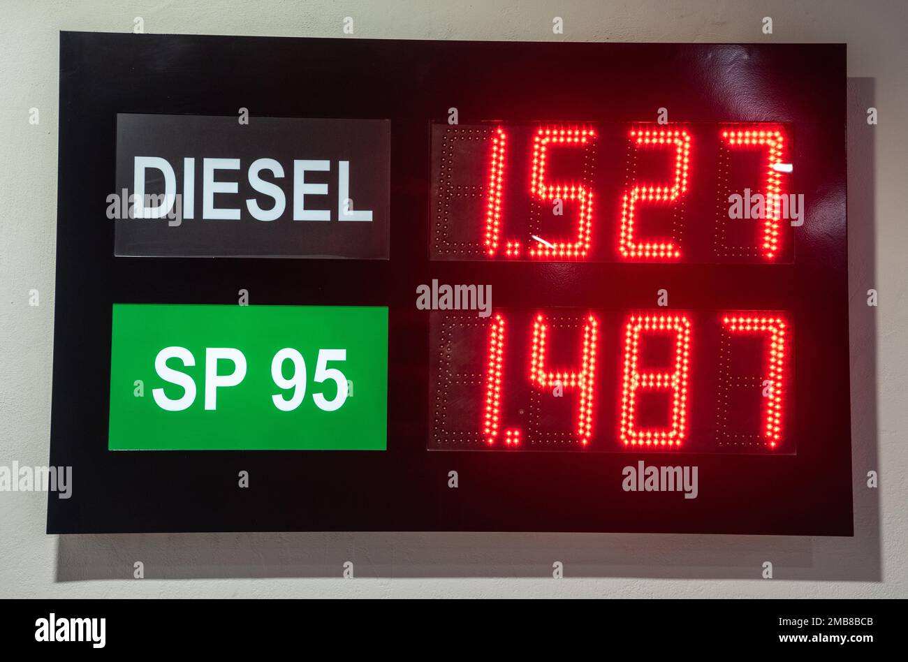 Gas pump in Spain showing prices per liter for diesel and SP 95. Taken in Alicante, Spain in January 2023. Stock Photo
