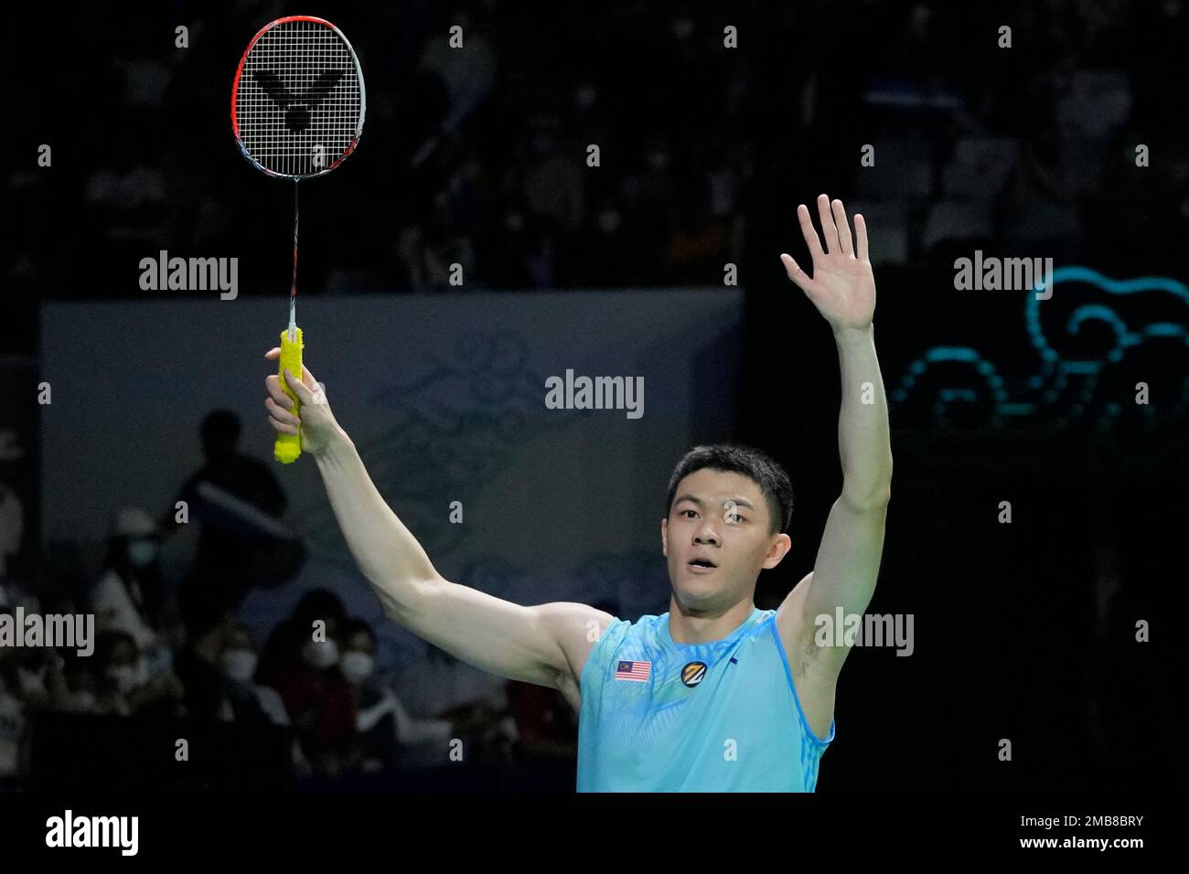 Malaysias Lee Zii Jia celebrates after defeating Singapores Loh Kean Yew during their mens singles quarterfinal match at Indonesia Open badminton tournament at Istora Gelora Bung Karno Stadium in Jakarta, Indonesia, Friday,