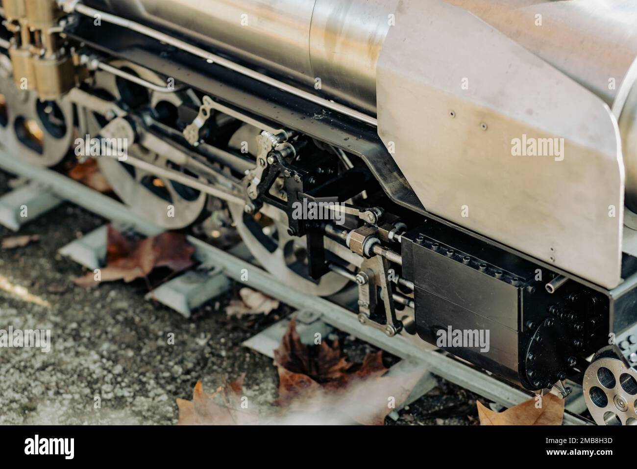 Old steam train wheel mechanism on a railway Stock Photo Alamy