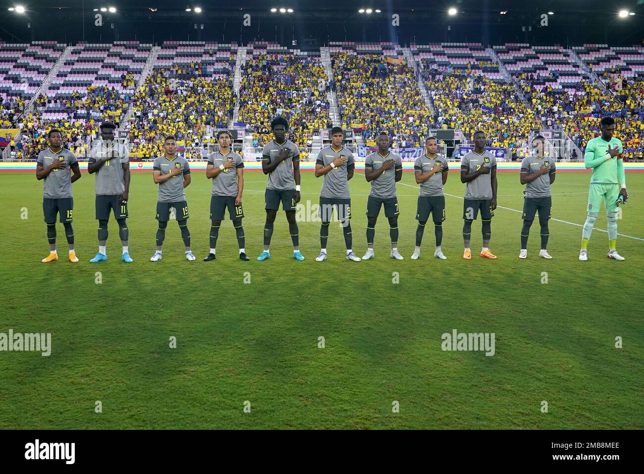 The Ecuador national team stands for the national anthem before an