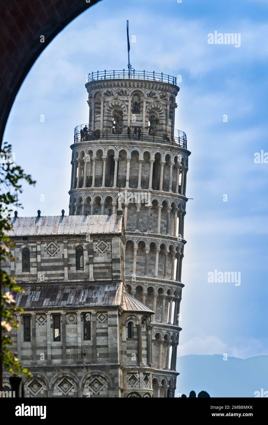 The Leaning Tower of Pisa, a freestanding bell tower, sits near the