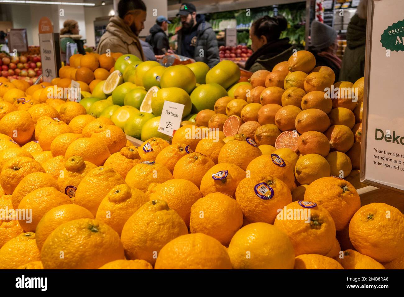 Shopping at the grand opening of Whole Foods Market Wall Street supermarket in New York on Wednesday, January 11, 2023. Analysts predict that tomorrows inflation data will confirm that inflation is cooling. (© Richard B. Levine) Stock Photo