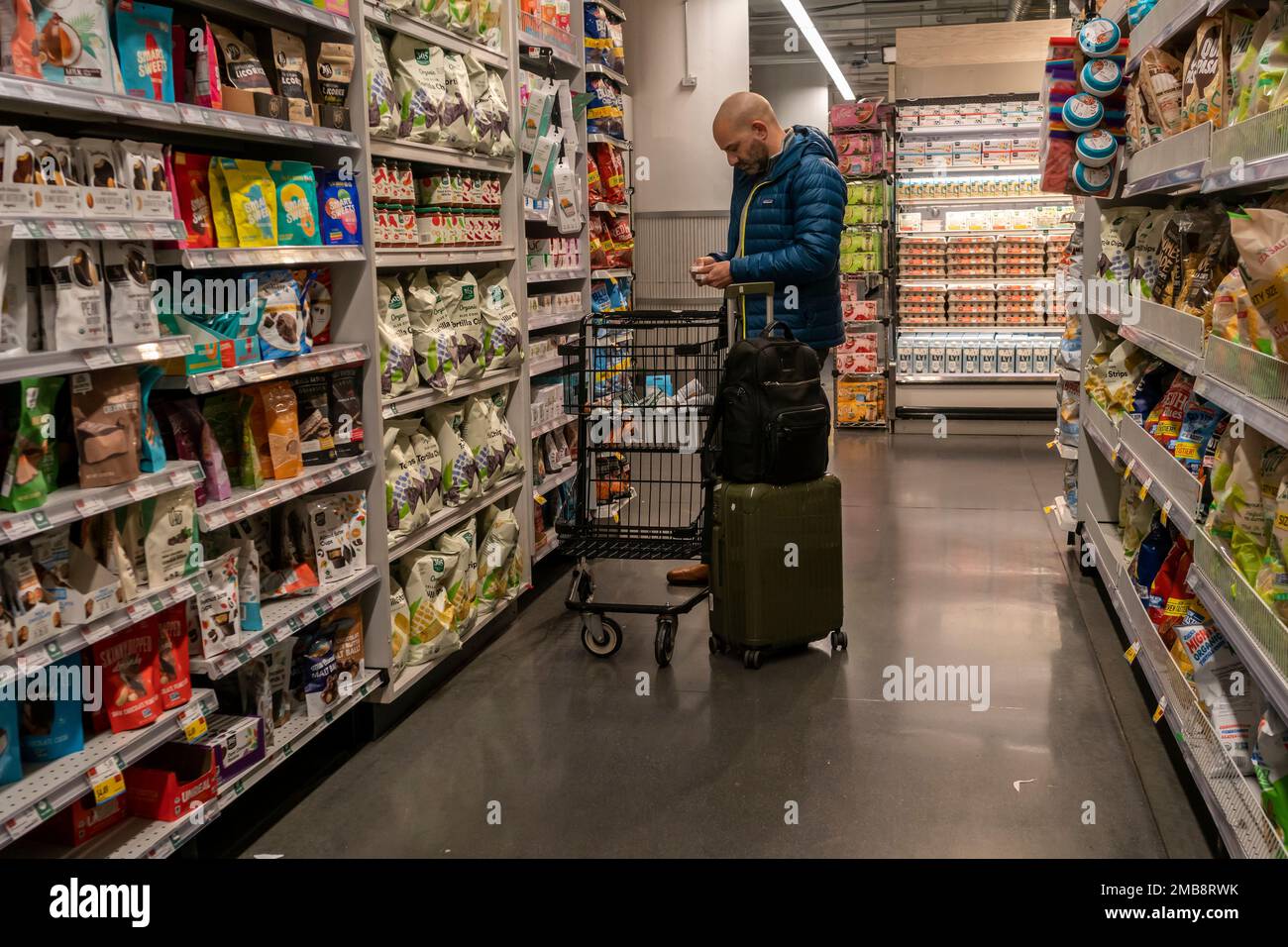 Shopping in a Whole Foods Market supermarket in New York on Friday, January 13, 2023. Economists are warning that the economy still faces a turbulent year ahead.  (© Richard B. Levine) Stock Photo