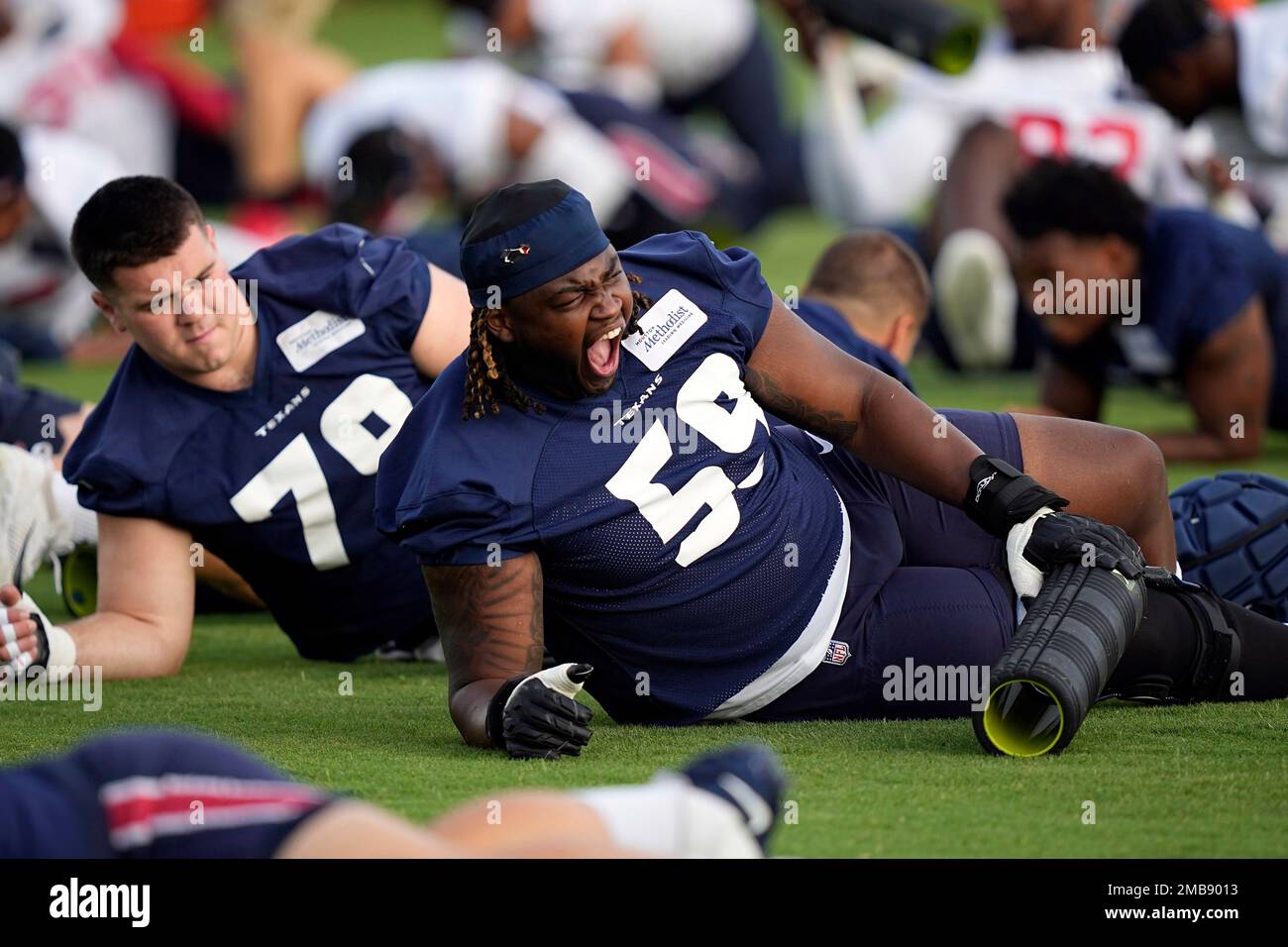 Houston Texans first round draft pick Kenyon Green yawns while stretching  during an NFL football minicamp Tuesday, June 14, 2022, in Houston. (AP  Photo/David J. Phillip Stock Photo - Alamy