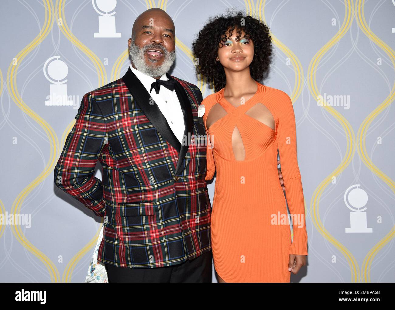 David Alan Grier, left, and Luisa Danbi Grier-Kim arrive at the 75th