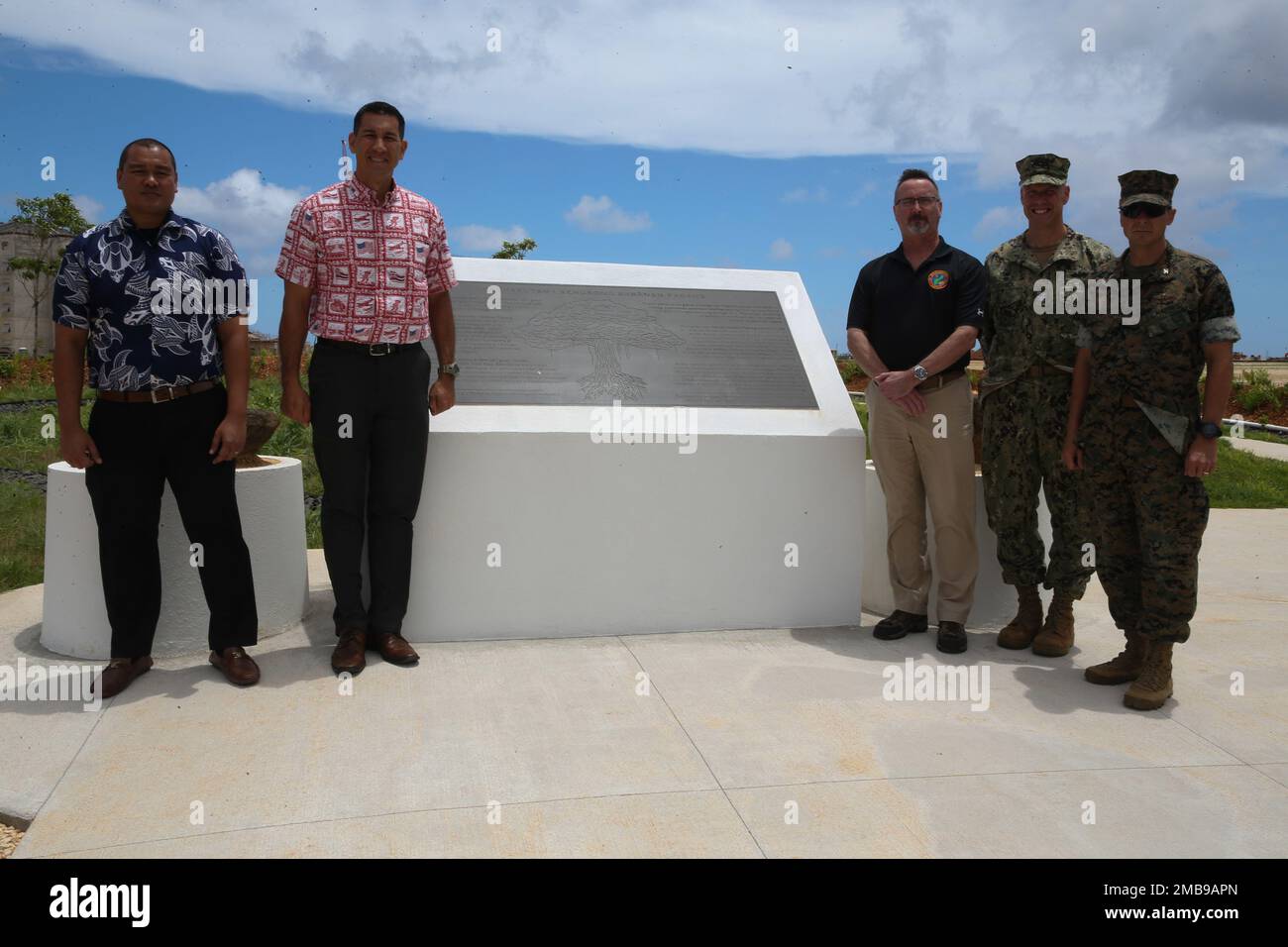U.S. Representative for Hawaii's 2nd Congressional District, Mr. Kai Kahele, center, poses for a photo in front of the Sabånan Fadang burial site with other key leaders at Marine Corps Base (MCB) Camp Blaz, Guam, June 13, 2022. The monument was proposed by the Guam State Historic Preservation office and supports MCB Camp Blaz's commitment to preserving and sharing the rich cultural heritage of Guam. Stock Photo
