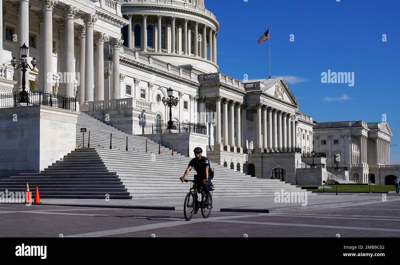 A U.S. Capitol Police officer patrols the East Plaza of the Capitol in ...