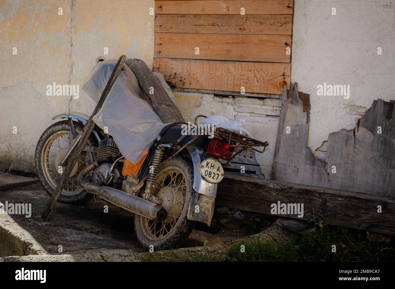 An antique motorcycle, spotted in Pletebna, Satovcha region, Bulgaria. Stock Photo