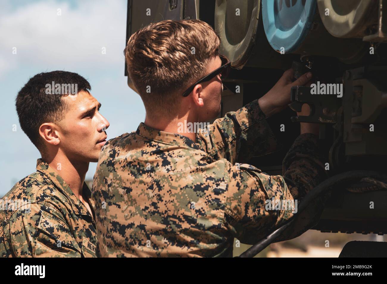 U.S. Marine Corps Cpl. Christian Hernandez, left, and Cpl. Zachary