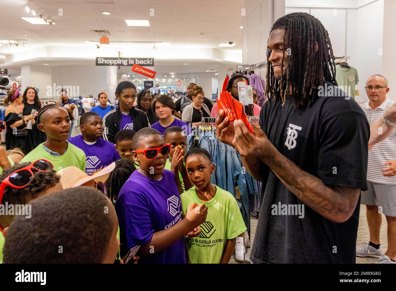 IMAGE DISTRIBUTED FOR JC PENNEY - Dallas Cowboys Wide Receiver, CeeDee  Lamb, center, joins Frisco Mayor Pro Temp Angelia Pelham and Councilwoman  Tammy Meinershagen to celebrate JCPenney's 120th birthday by gifting kids  from the Collin