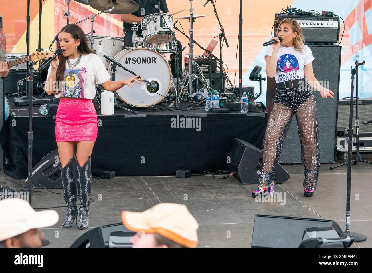 Maddie Font, left, and Taylor Kerr of Maddie & Tae perform during CMA