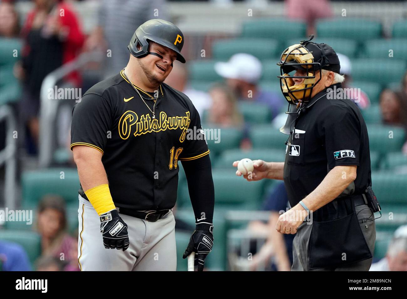 Pittsburgh Pirates' Daniel Vogelbach reacts after a called third
