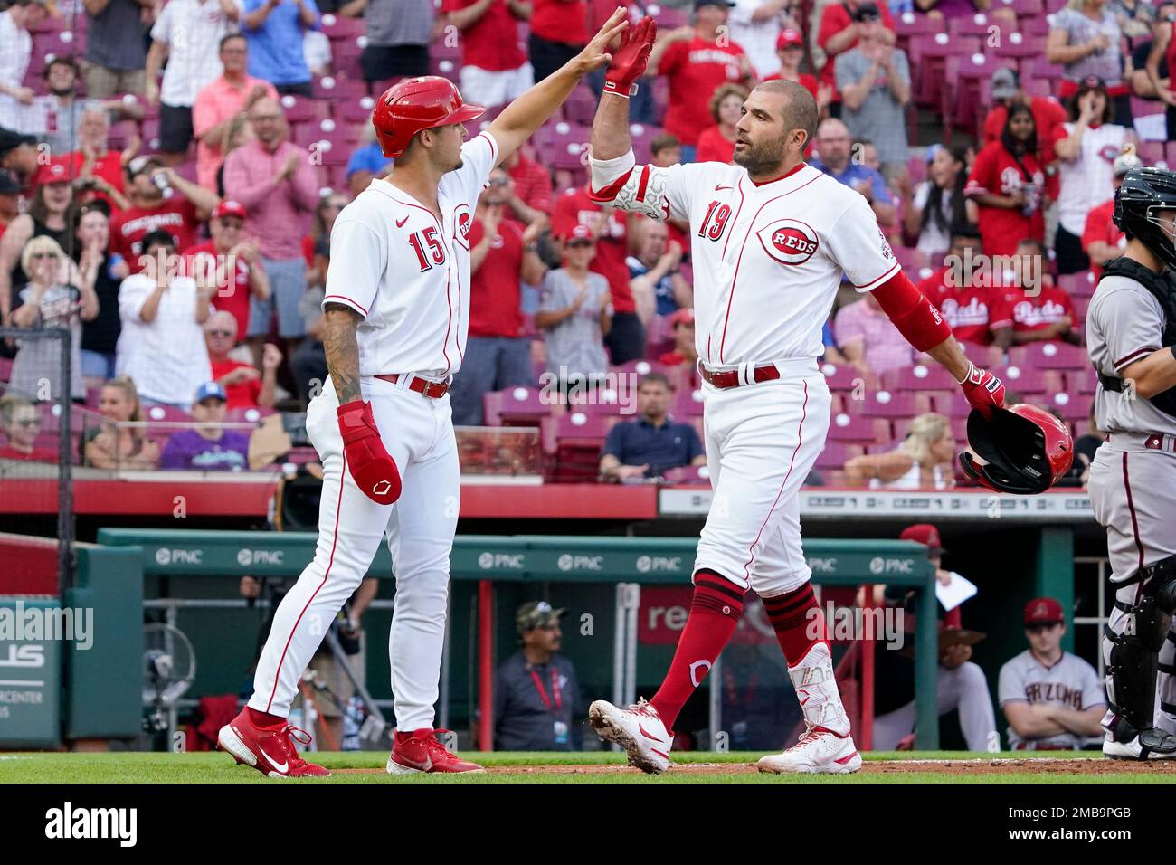 Something to celebrate: Joey Votto, Jesse Winker get Reds offense