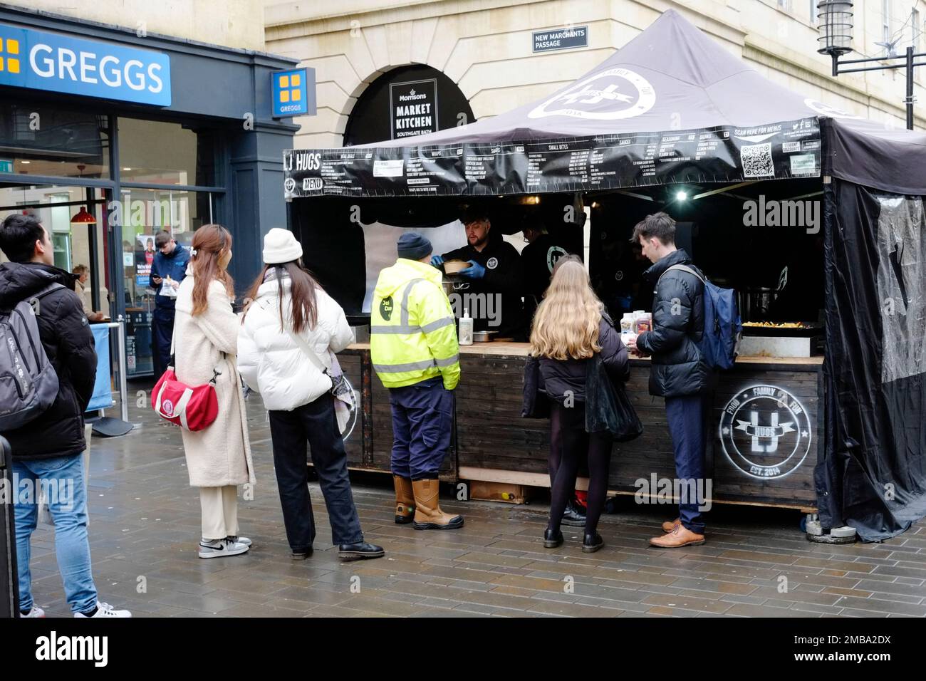 Winters day in Bath city centre in Somerset UK LJ Hugs fast Food stall ...