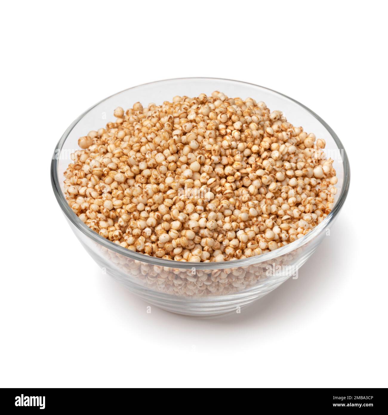 Glass bowl with healthy puffed quinoa close up isolated on white background Stock Photo