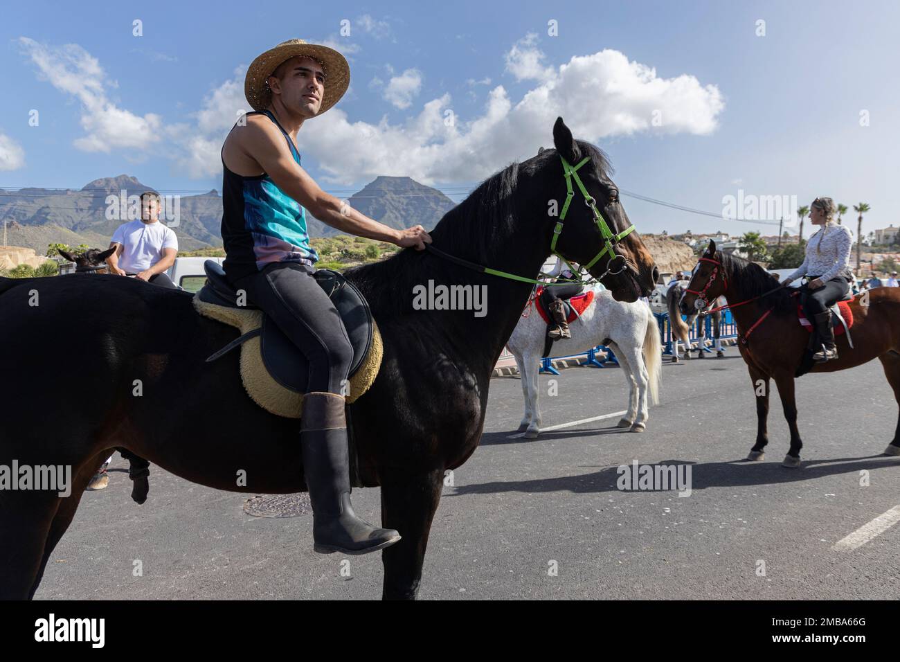 Costa Adeje, Tenerife, Canary Islands, 20 January 2023.A rider on horseback at the fiesta of San Sebastian which returns for the first time since 2020 due to the covid pandemic restrictions. The annual fiesta in La Caleta on the Costa Adeje is enjoyed by locals and tourists who gather to see the many horses that come to bathe in the sea at the Playa Enramada beach. Credit: Phil Crean A/Alamy Live News Stock Photo