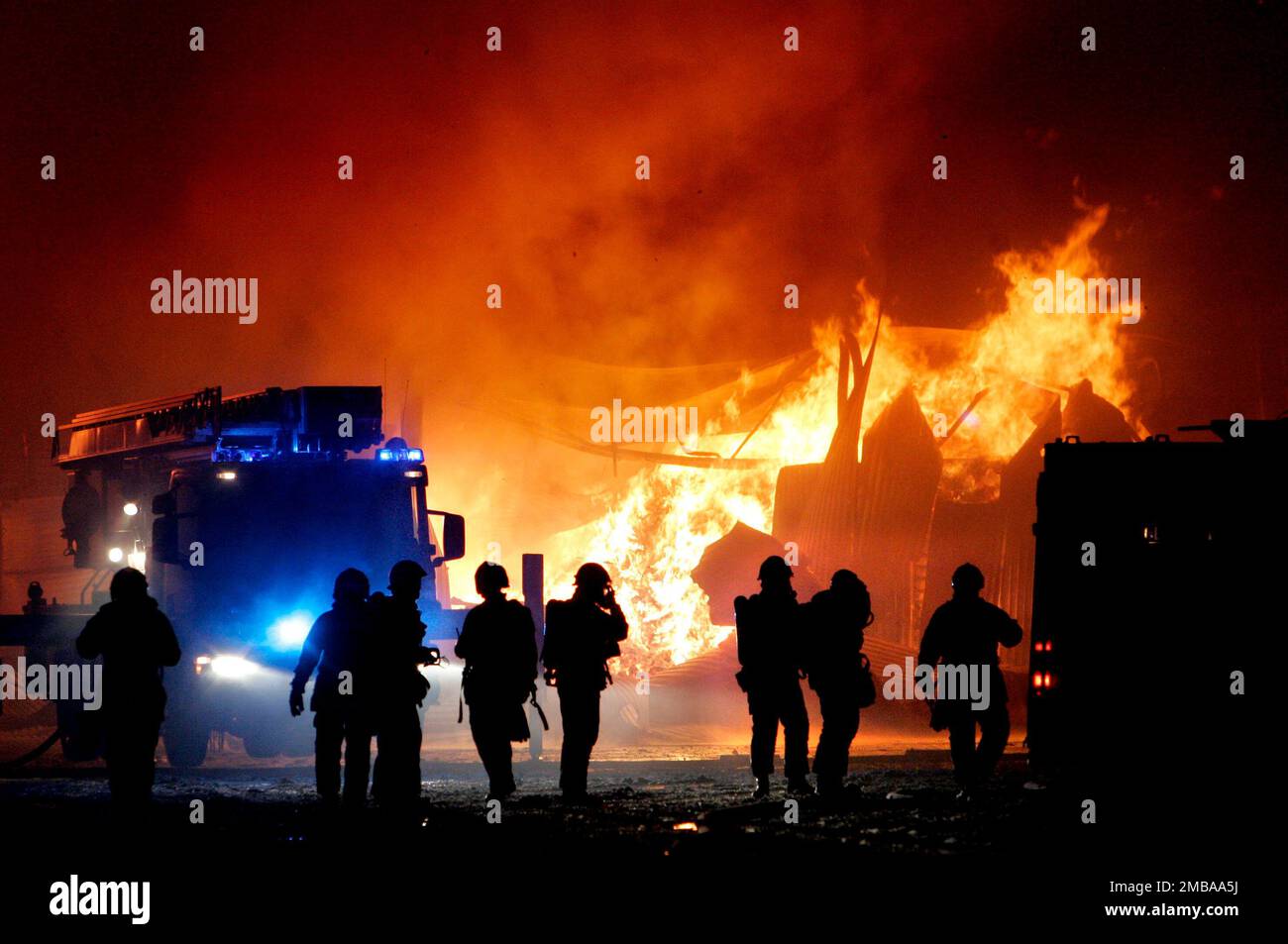 An extensive fire broke out at Runsven's warehouse in Mjölby, Sweden, this morning. Half the industrial building burned down, a total of 3,000 square meters. The warehouse held various goods such as barbecue charcoal, hair shampoo and toilet paper. Emergency services from four stations were at the scene of the fire. Stock Photo