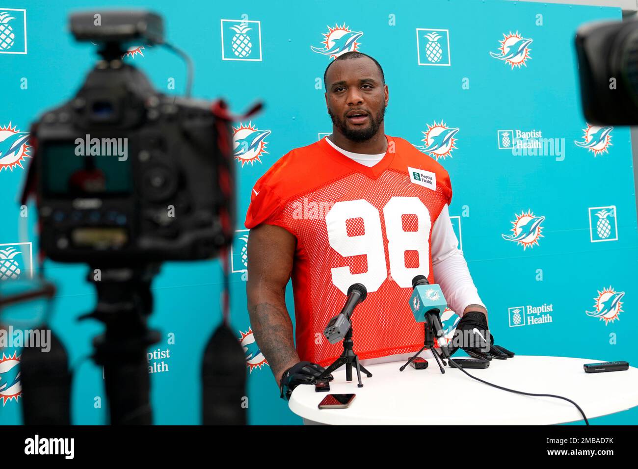 Miami Dolphins defensive tackle Raekwon Davis (98) walks on the sidelines  during a NFL football game against the New York Jets, Sunday, Dec. 19,  2021, in Miami Gardens, Fla. (AP Photo/Doug Murray