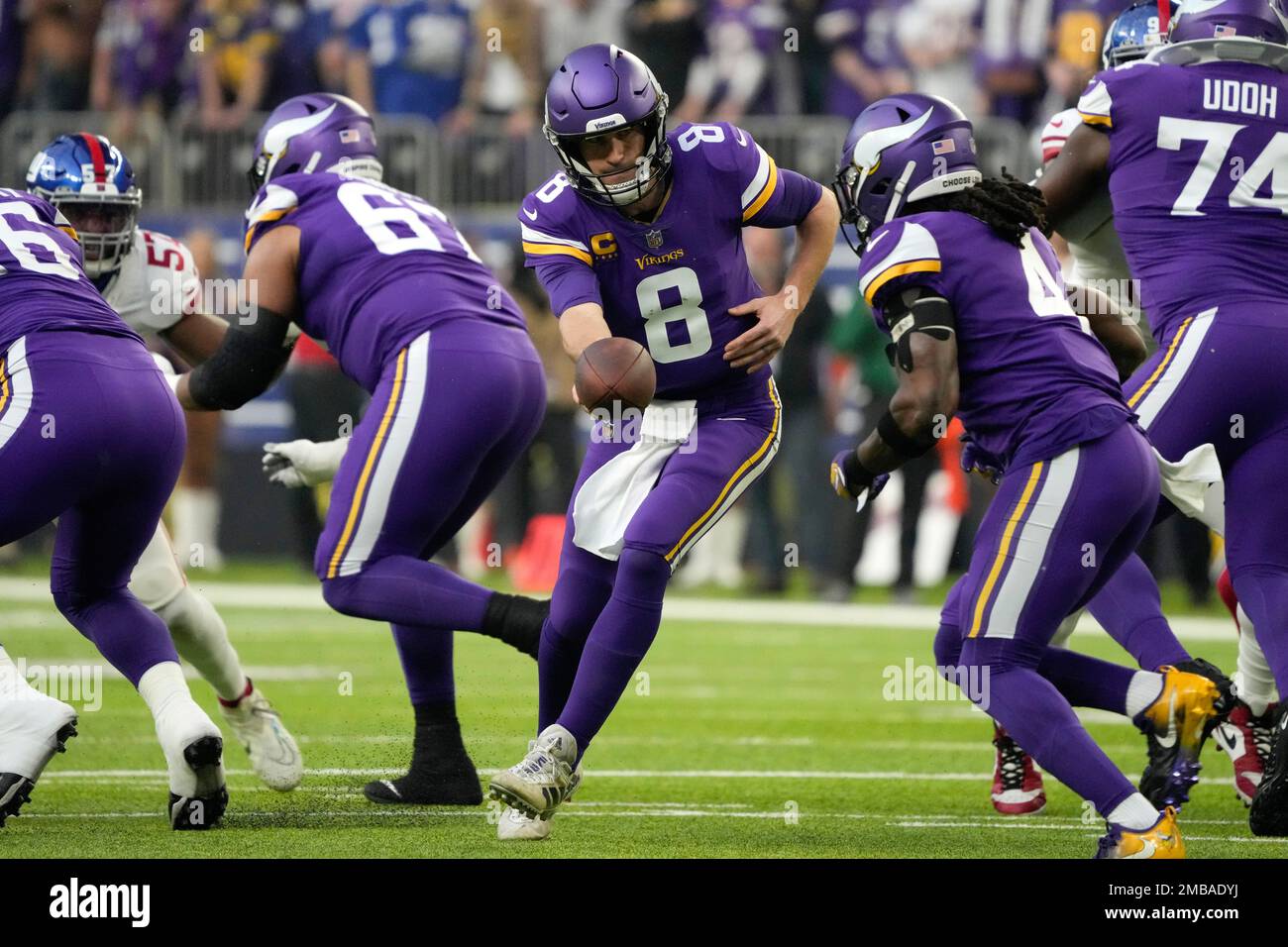 Minnesota Vikings quarterback Kirk Cousins, right, hands off to running  back Dalvin Cook (4) in the second half of an NFL football game against the  Buffalo Bills, Sunday, Nov. 13, 2022, in