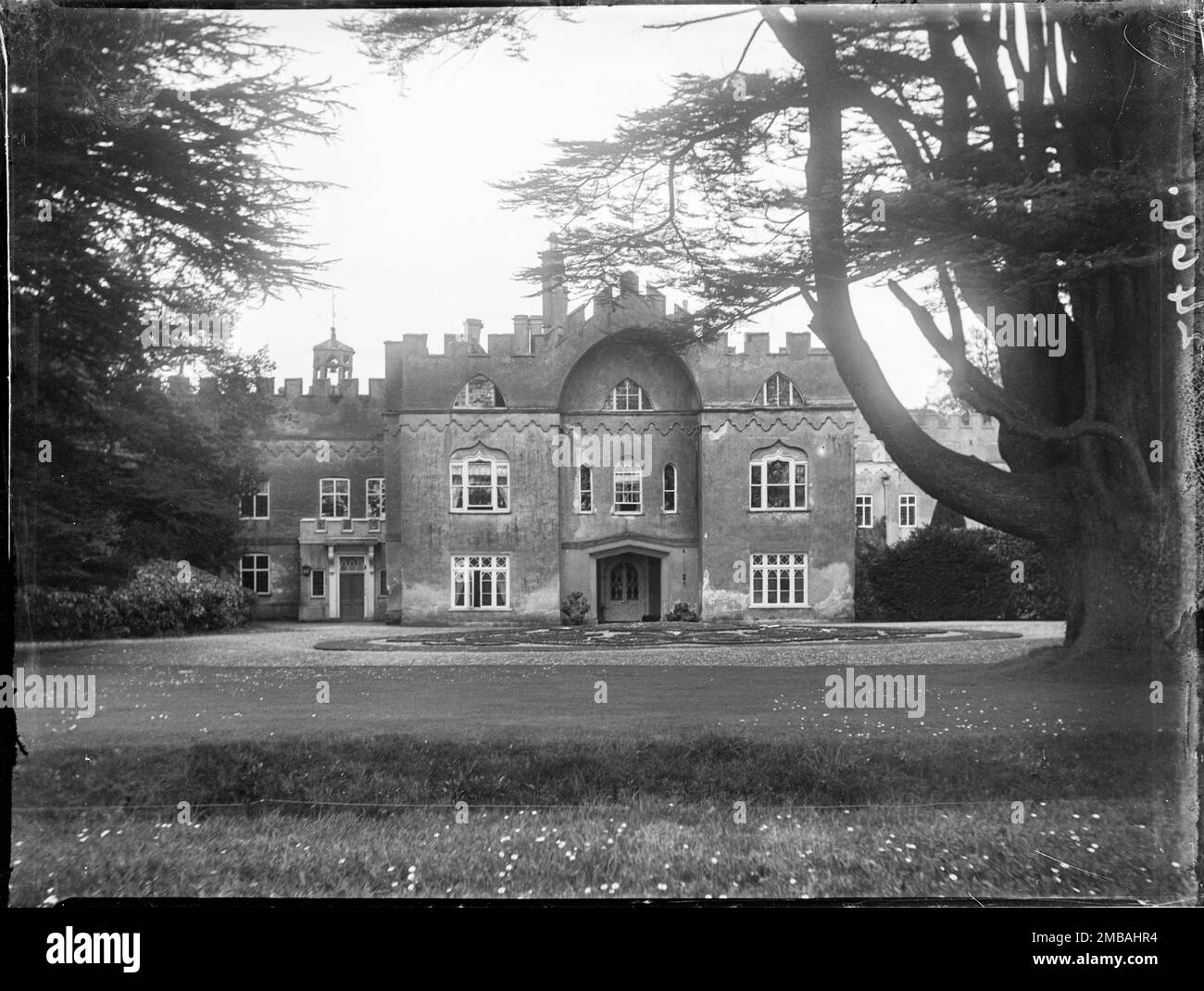 Hampden House, Great Hampden, Great and Little Hampden, Wycombe, Buckinghamshire, 1910. The main entrance at Hampden House seen from the west, with a cedar tree on the right of the foreground. Stock Photo
