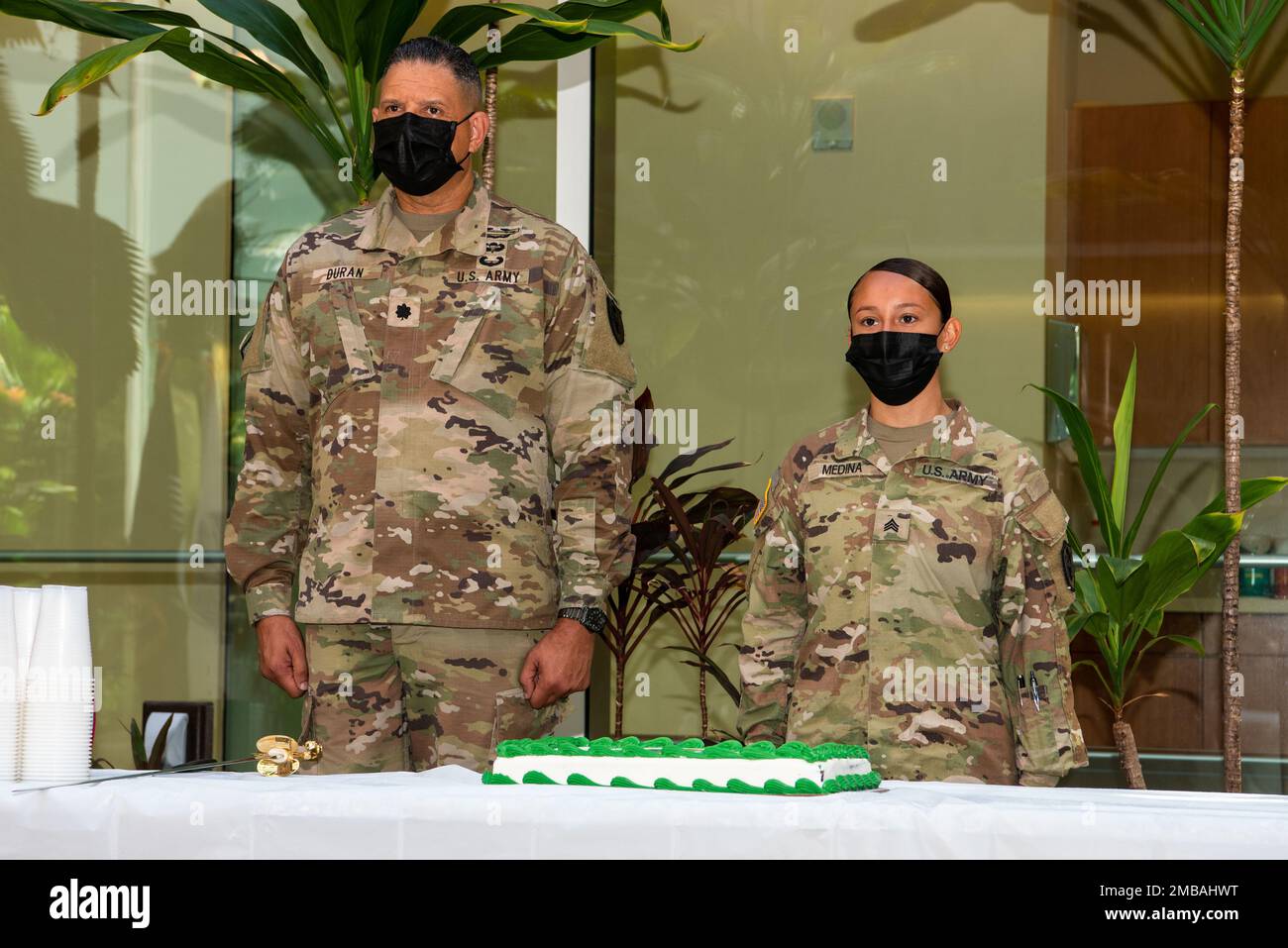 Lt. Col. Alex Duran and Sgt. Janice Medina, the oldest and youngest soldier attached to the Defense POW/MIA Accounting Agency cut the cake in a ceremony for the 247th Army birthday at the DPAA Facility on Joint Base Pearl Harbor-Hickam, Hawaii, June 14, 2022. The ceremony was held to commemorate the Army birthday honoring 247 years of rich history and defense of the nation. DPAA's mission is to achieve the fullest possible accounting for missing and unaccounted for U.S. personnel to their families and our nation. Stock Photo