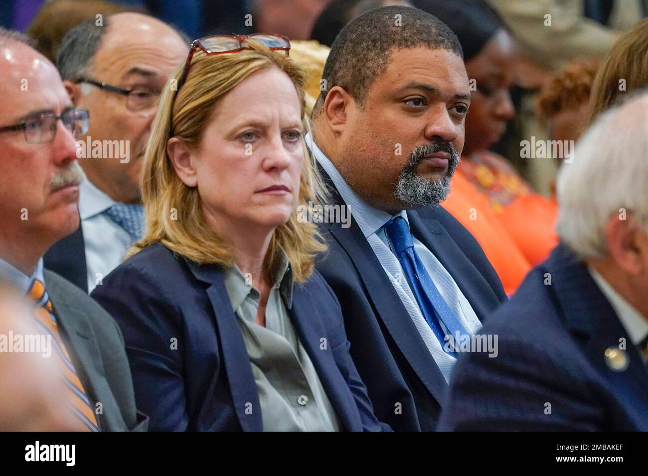 Alvin Bragg, right, New York County District Attorney, and Melinda Katz,  Queens County District Attorney attend a ceremony where Gov. Kathy Hochul  signed a package of bills to strengthen gun laws, Monday,