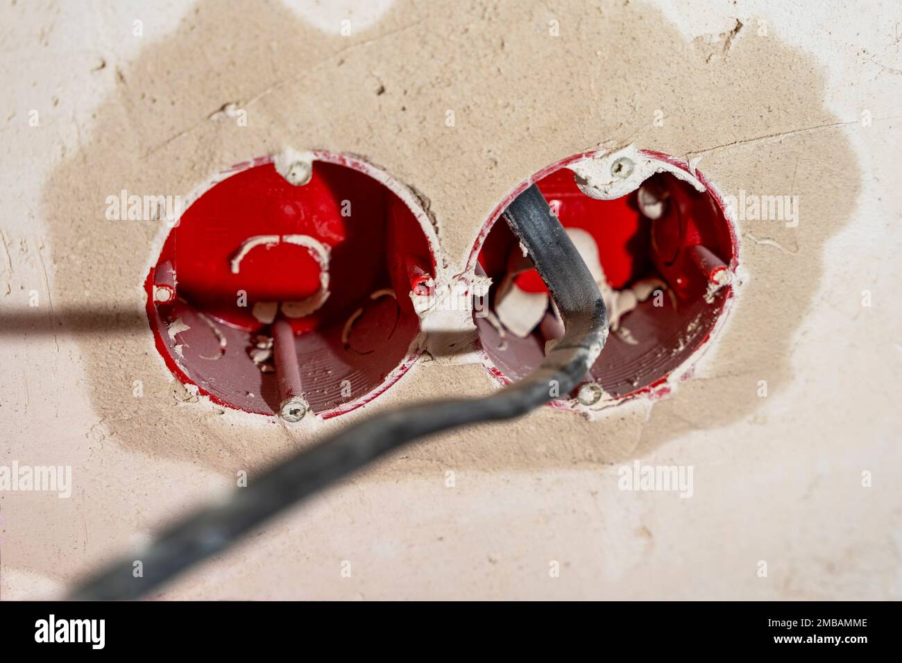 Power socket boxes with electric wires. Closeup. Renovation Stock