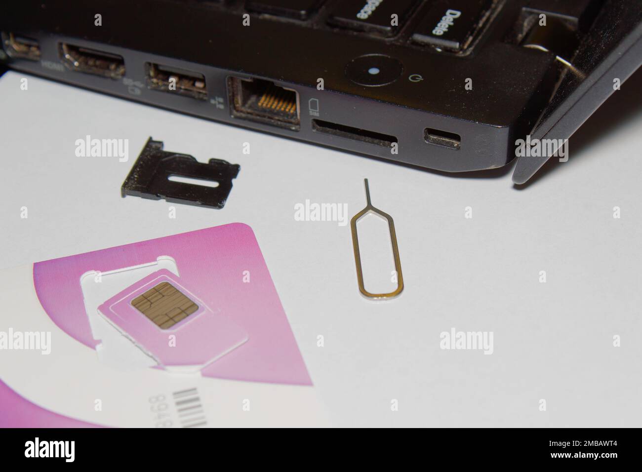laptop sim slot insert Internet sim card Stock Photo - Alamy