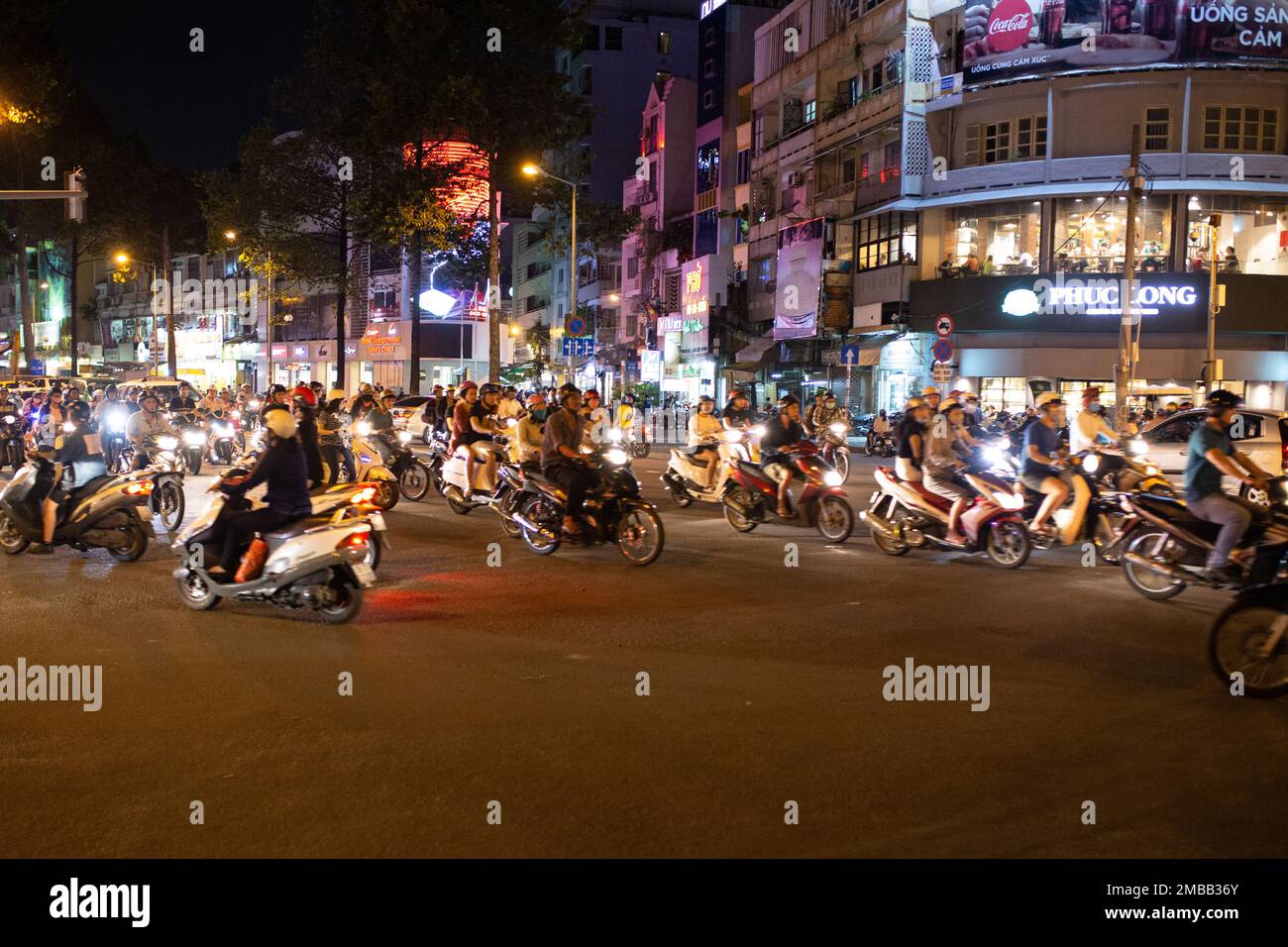 HOCHIMINH CITY, VIETNAM - Feb 24, 2017: People Cross The Road In