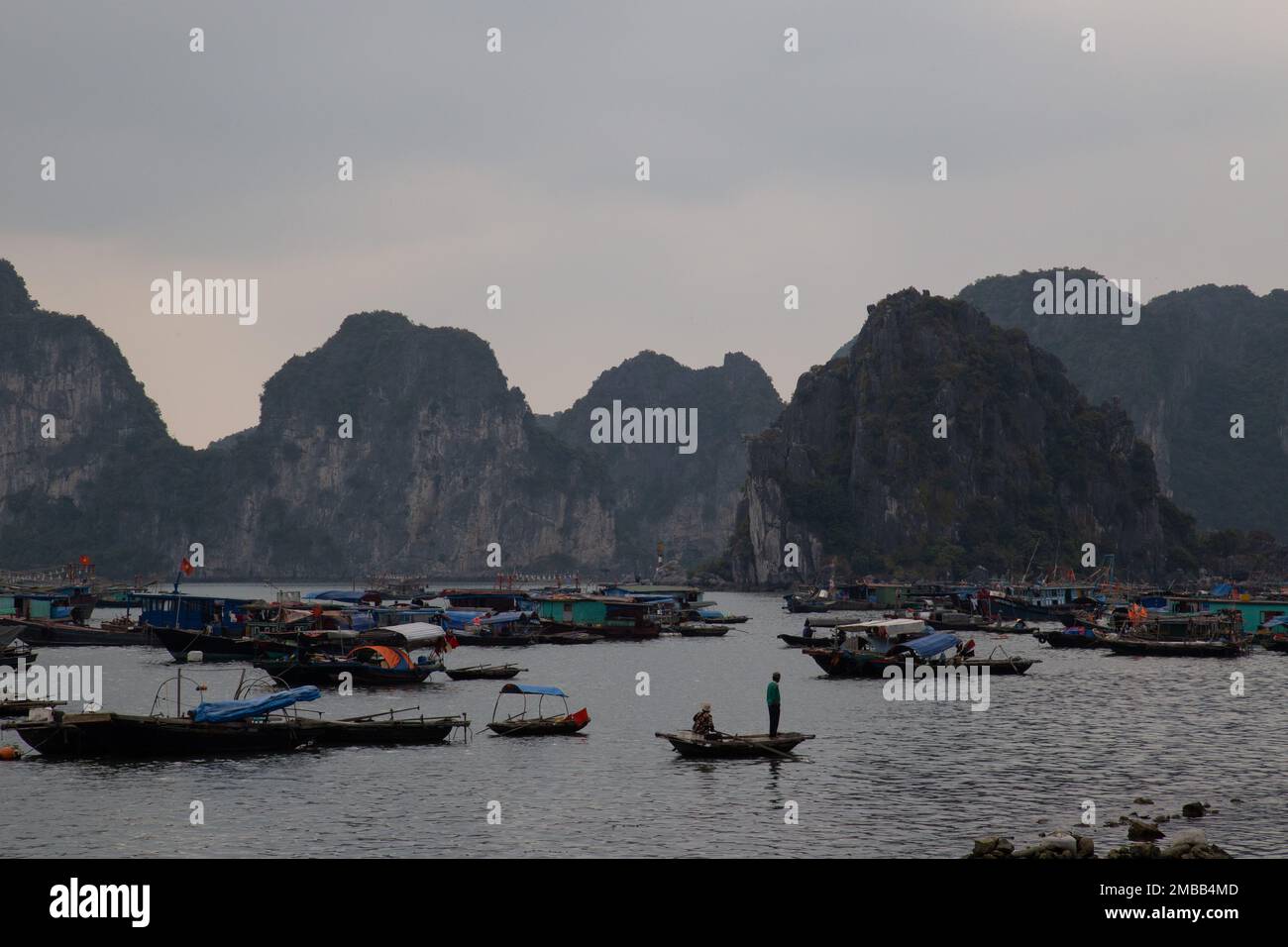 Ha Long Bay ( Halong bay ) View Over Landscape - boats float through the impressive landscape . Ha Long Bay , Vietnam Stock Photo