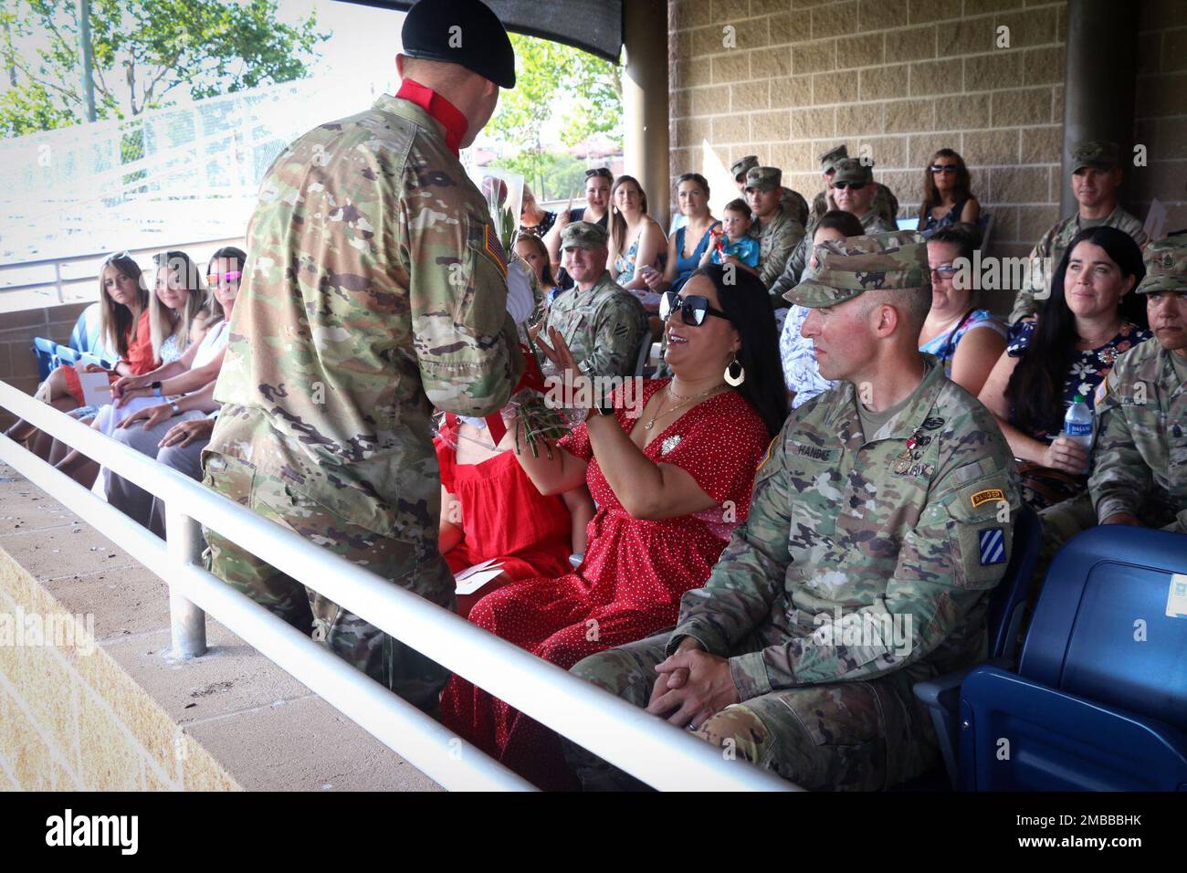 Mrs. Rachel Handke, left, spouse of Lt. Col. Joseph L. Handke, right ...