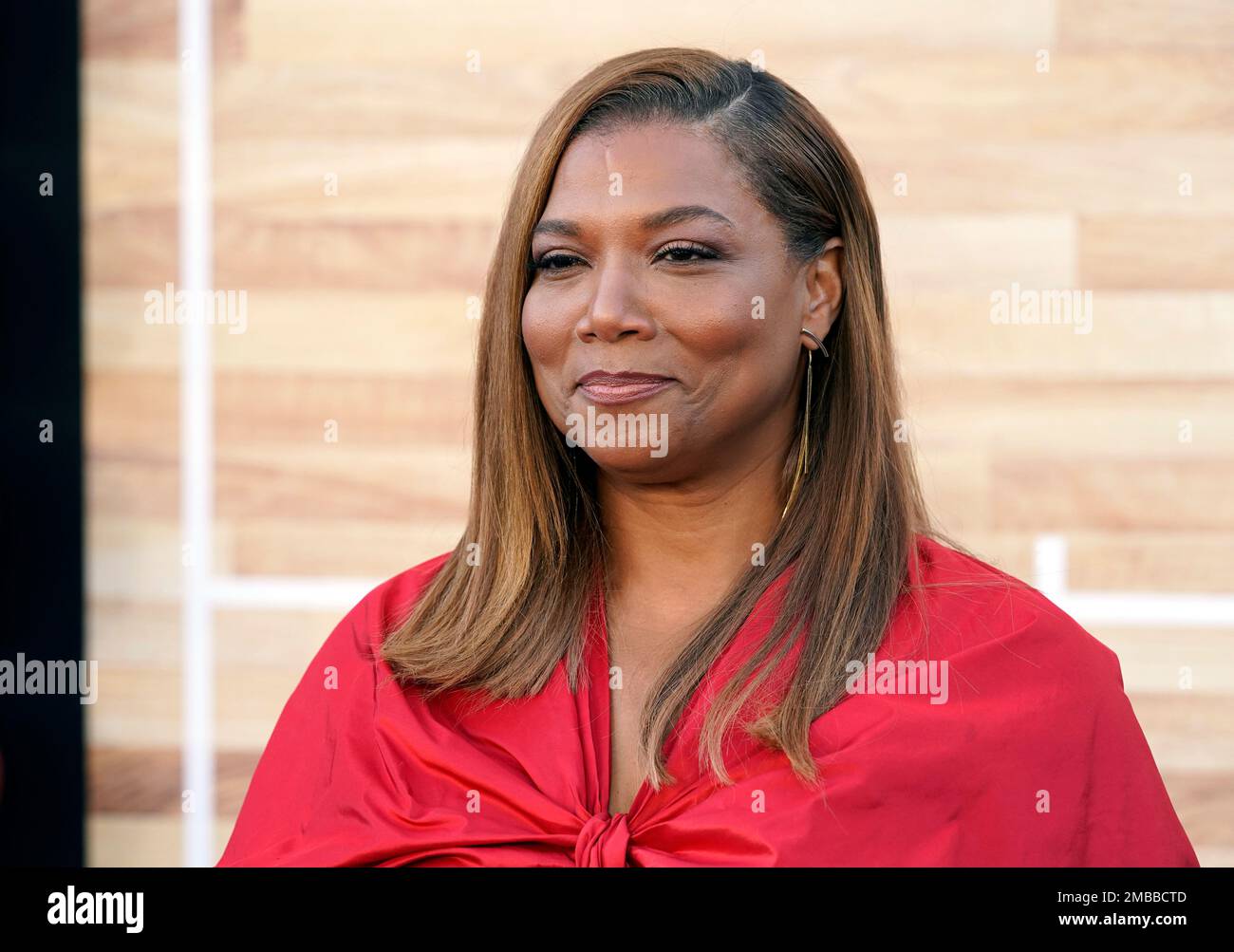 Queen Latifah poses at the premiere of the film "Hustle," Wednesday