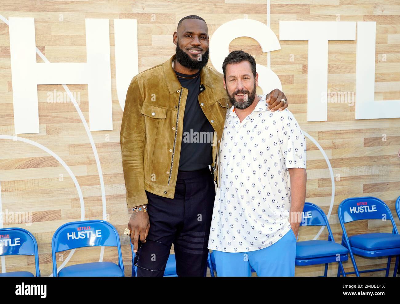LeBron James, left, and Adam Sandler pose together at the premiere of ...